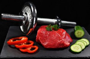 meat with vegetables and bar bell