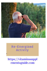senior holding binoculars outdoors